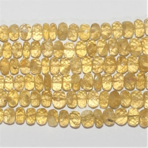 Yellow Beryl Faceted Graduated Rondelle Beads 5x3- 10x7mm. Approx.- Strand 40cm.