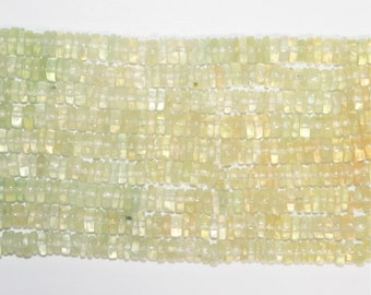 May include: A strand of light green and yellow square-shaped beads. The beads are made of natural stone and have a smooth, polished finish.