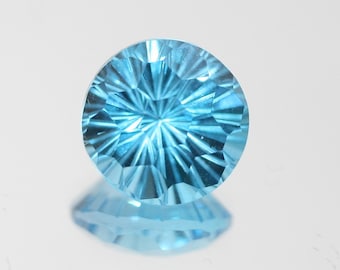 Topacio suizo redondo tallado en facetas, pieza única de 11,5 mm (7,63 ct). Talla única en piedra. Forma muy elegante.