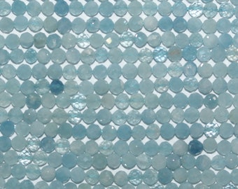 Perline rotonde sfaccettate di acquamarina da 15" 3 mm. Filo da 39 cm.