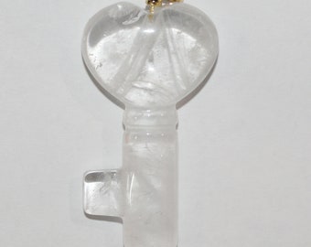 Colgante de llave lisa de cuarzo cristal de roca 40x22mm.