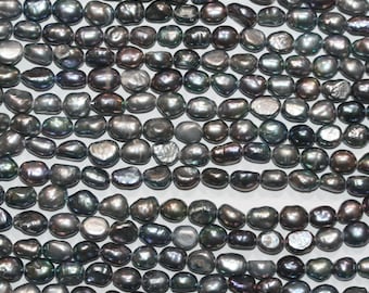 Hilo de 36 cm (14") con perlas barrocas grises de agua dulce de 6-7 mm. Artículo 15247.