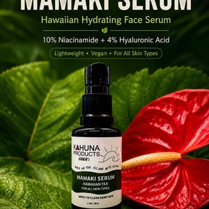 May include: A black bottle of Mamaki Serum, a Hawaiian hydrating face serum, sits on a green leaf. The label reads "Kahuna Products Hawaii" and lists ingredients like 10% Niacinamide and 4% Hyaluronic Acid. The bottle contains 1 oz / 30 g of serum.