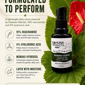 May include: A black bottle of Kahuna Products Mamaki Serum, a Hawaiian tea serum for all skin types. The label includes the text "Made on the Island with Aloha" and details about the serum's ingredients and benefits. The image also includes green leaves and a red flower.