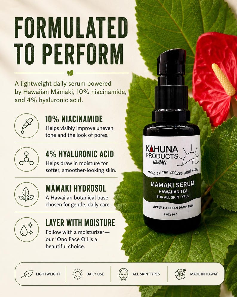 May include: A black bottle of Kahuna Products Mamaki Serum, a Hawaiian tea serum for all skin types. The label includes the text "Made on the Island with Aloha" and details about the serum's ingredients and benefits. The image also includes green leaves and a red flower.