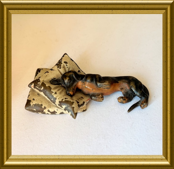 Antique small bronze animal figurine: dog, dachshund