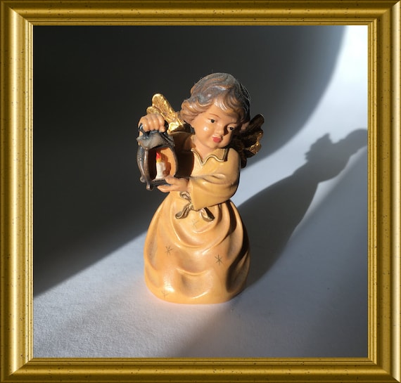 Vintage wood carved figurine: angel with lantern