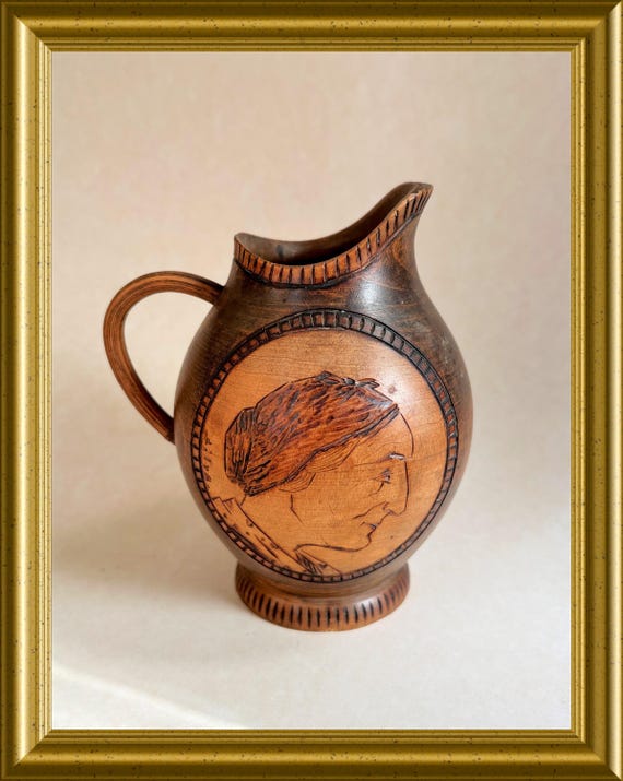 Vintage small old wooden jug