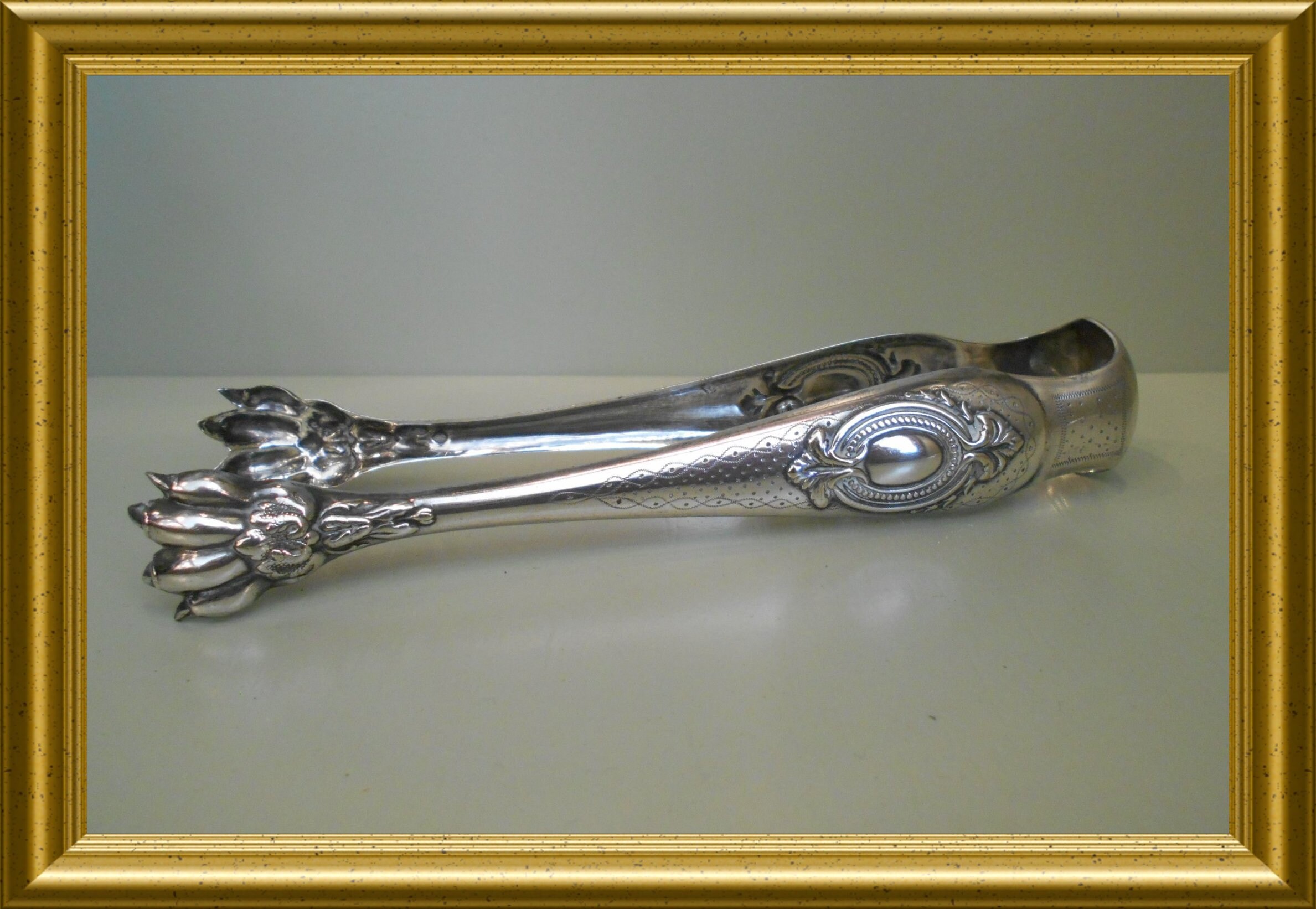 Antique silver plated sugar tongs / ice tongs, with claws