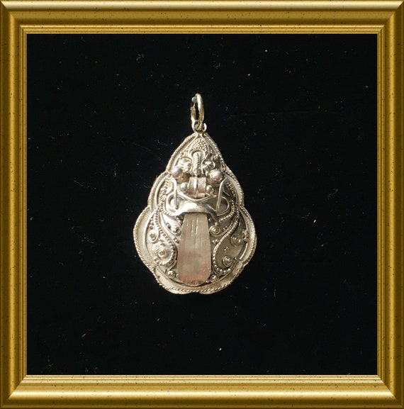 Vintage silver pendant: Rangda, demon queen