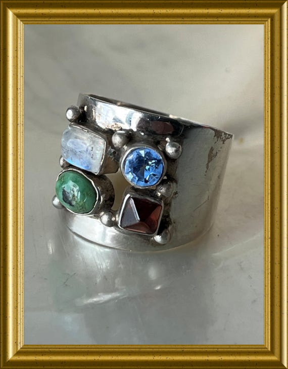 Beautiful silver ring with gemstones