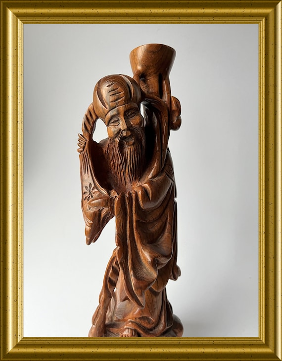 Gorgeous Asian wood carving: wooden figurine of a man