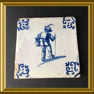 Antique glazed earthenware tile