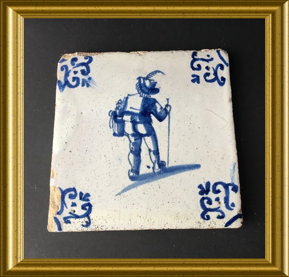 Antique glazed earthenware tile