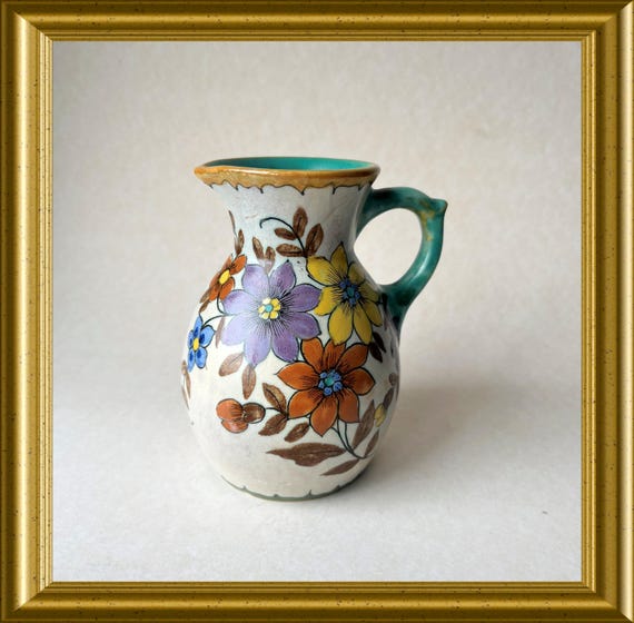 Beautiful handpainted art pottery jug : PZH Gouda, decor Ramia
