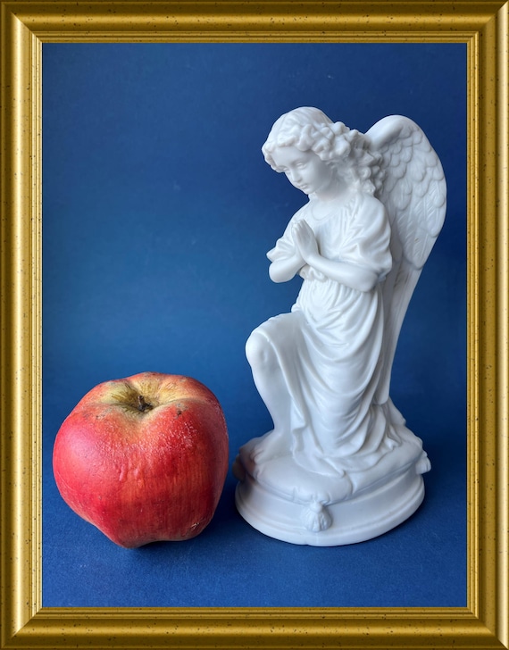 Antique bisque porcelain figurine: kneeling angel