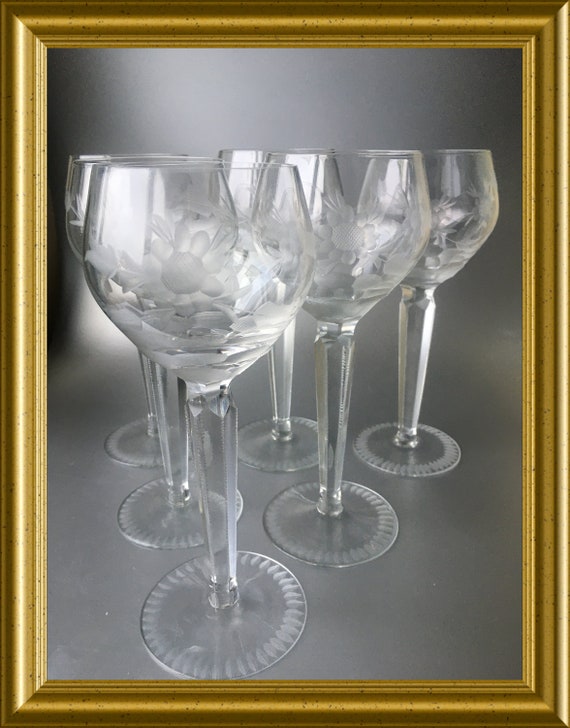 Six high-stemmed floral edged crystal wineglasses