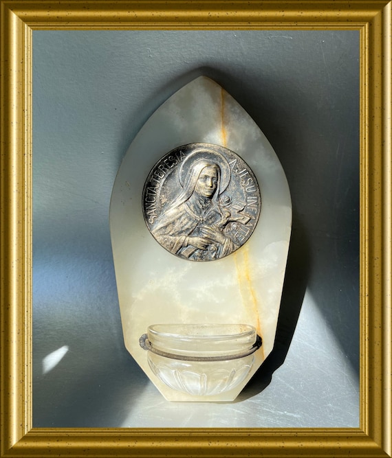 Antique holy water font: onyx, saint Therese