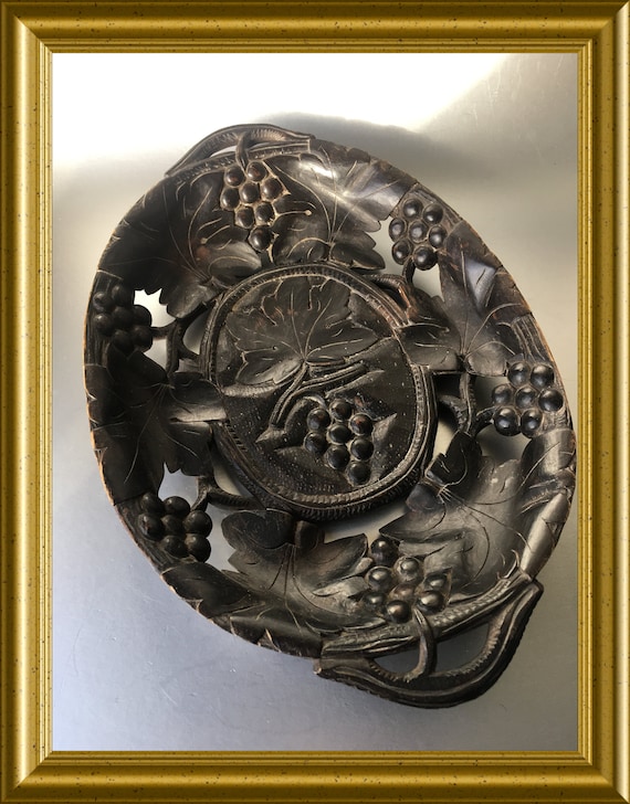 Antique wood carving: wooden bowl