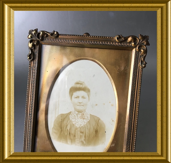 Antique frame with brass passe-partout
