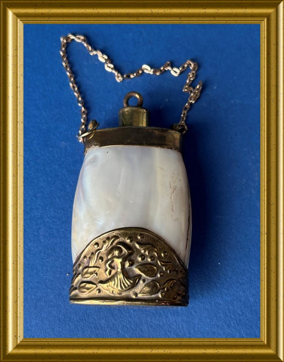 Antique mother of pearl perfume bottle
