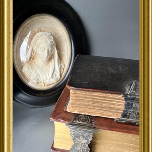 Antique black oval wooden frame: meerschaum, Madonna, Mary