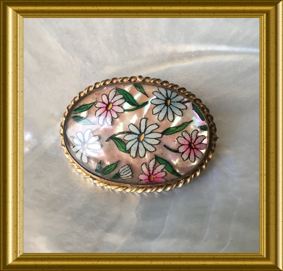 Antique brooch: painted flowers on mother of pearl