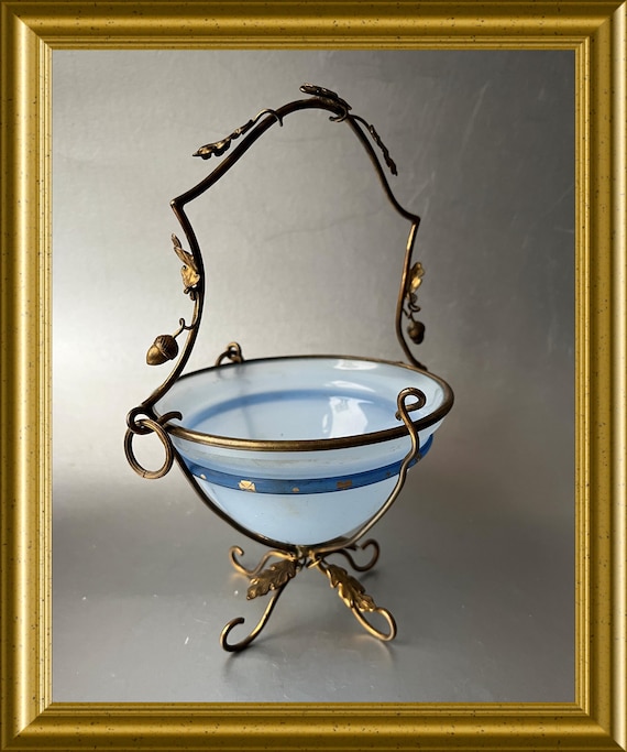 Antique blue glass bowl in brass setting