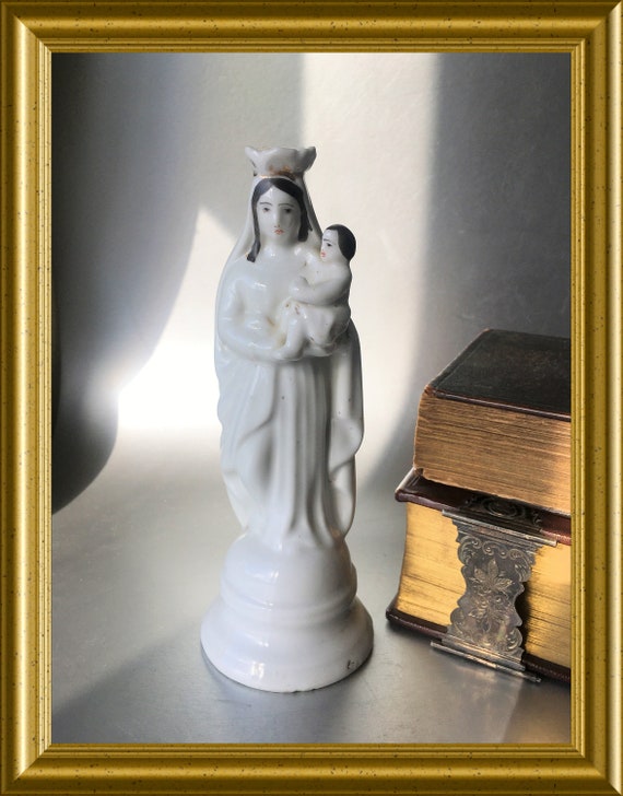 Antique porcelain figurine: Holy Mary with child Jesus