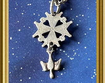 Small silver Huguenot cross pendant on necklace