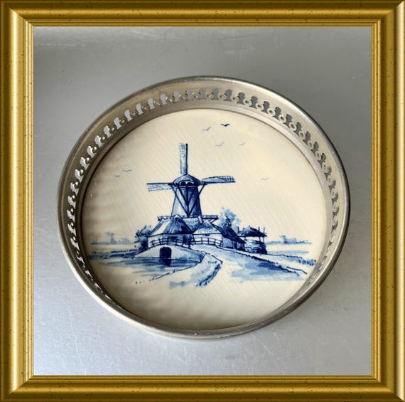 Beautiful Delftware coaster with pewter rim