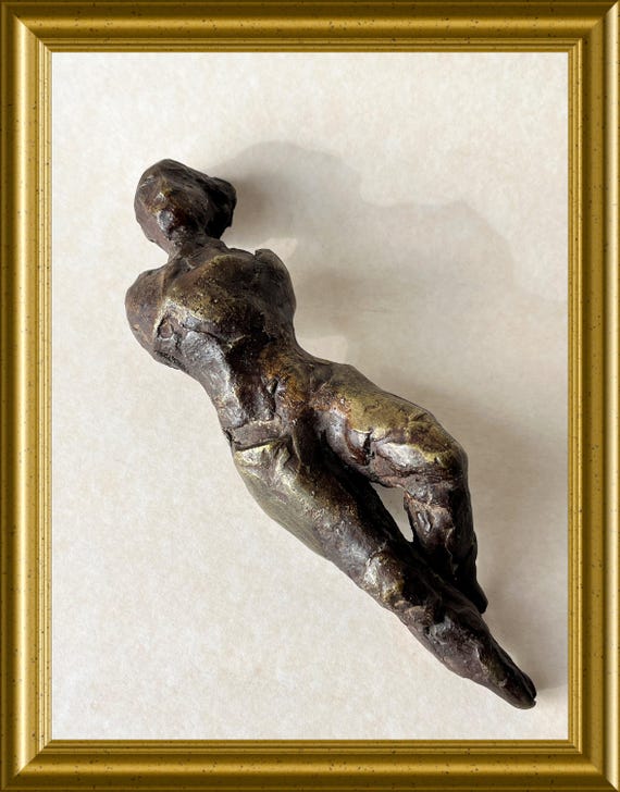 Small bronze sculpture : woman
