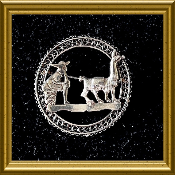 Beautiful vintage silver brooch: man with lama, Peru