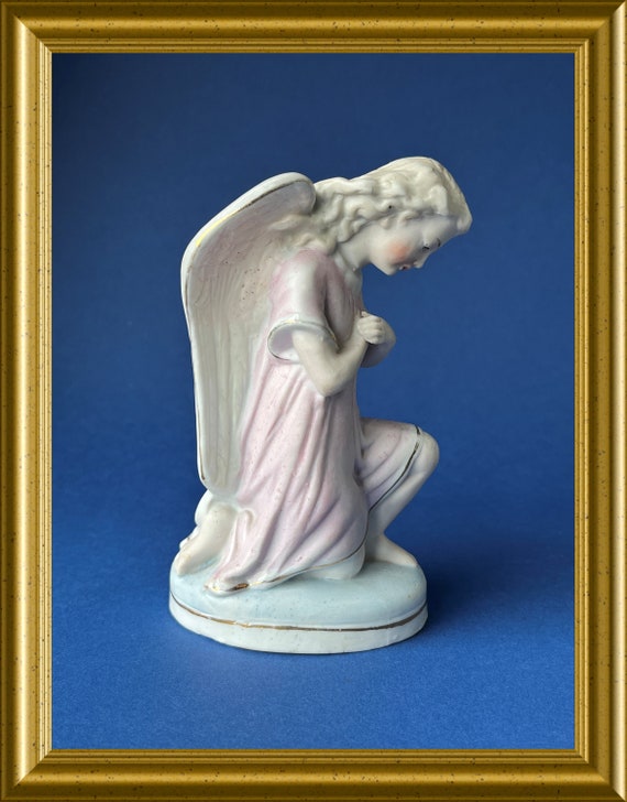 Antique bisque porcelain figurine: kneeling angel