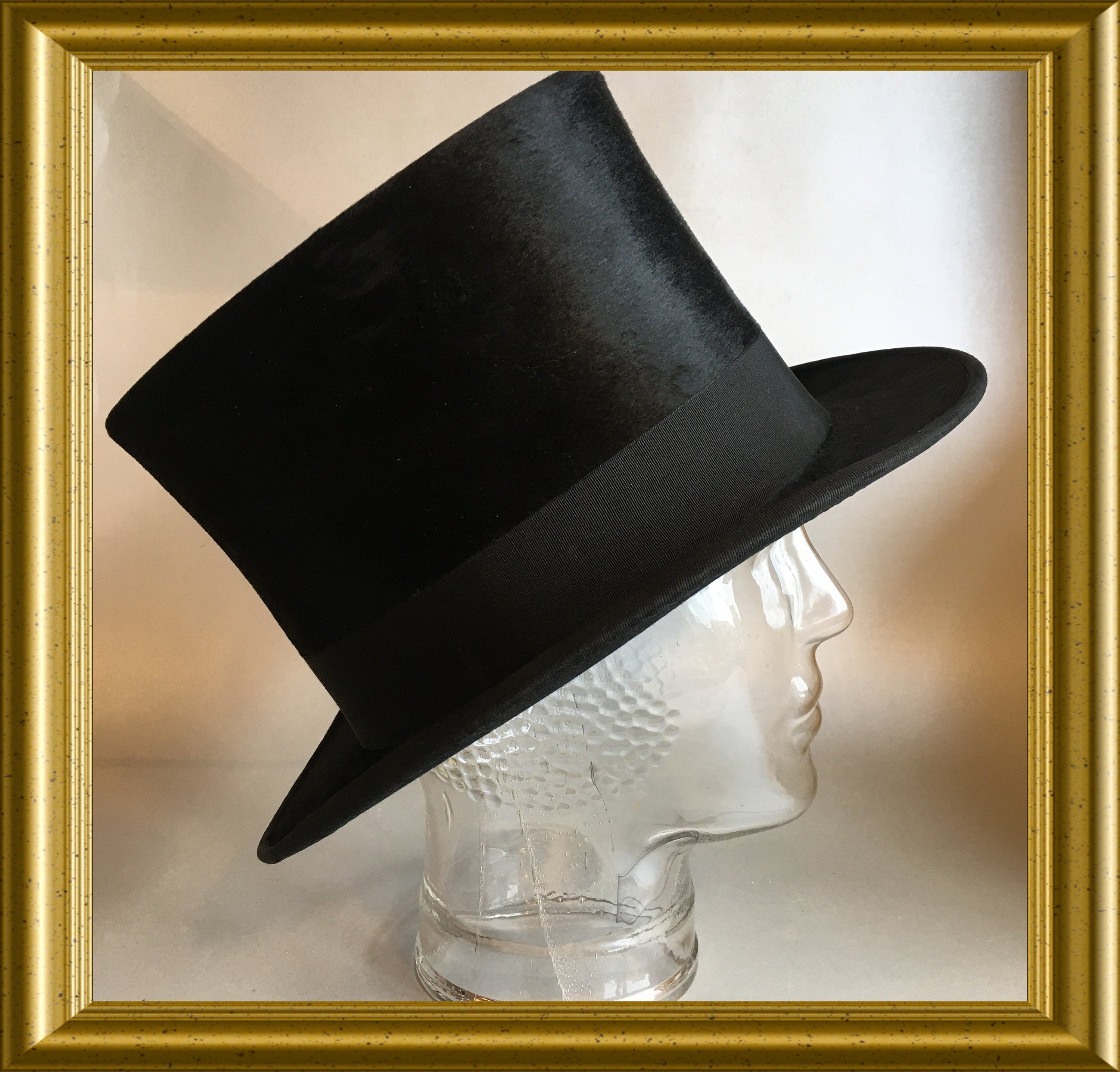 Antique black top hat with box, Burton