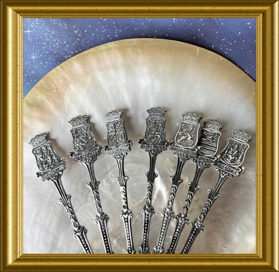 Vintage Dutch silver spoons: Douwe Egberts, 7 pieces