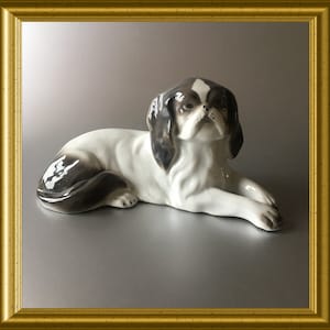Antique porcelain dog figurine
