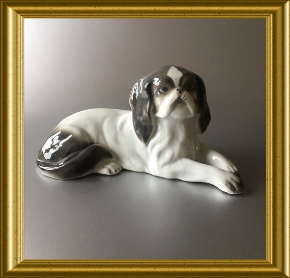 Antique porcelain dog figurine