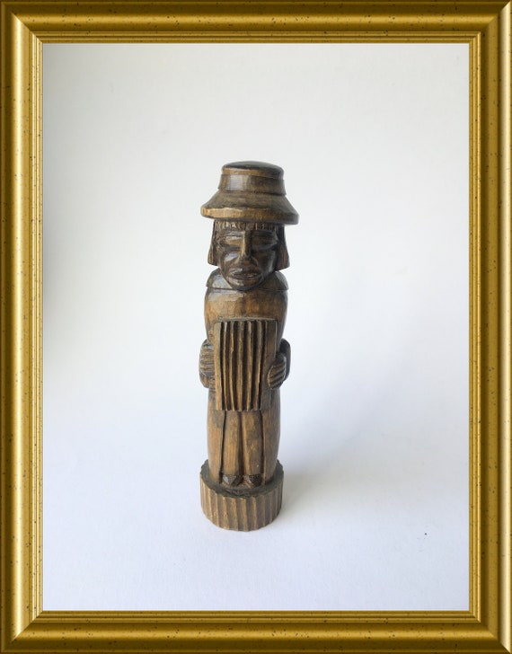 Art deco woodcarving: wooden figurine, man with accordion
