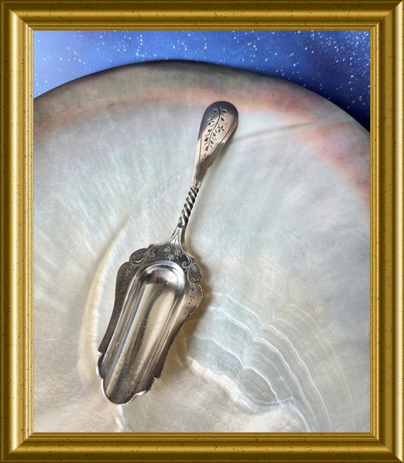 Antique Dutch silver sugar spoon
