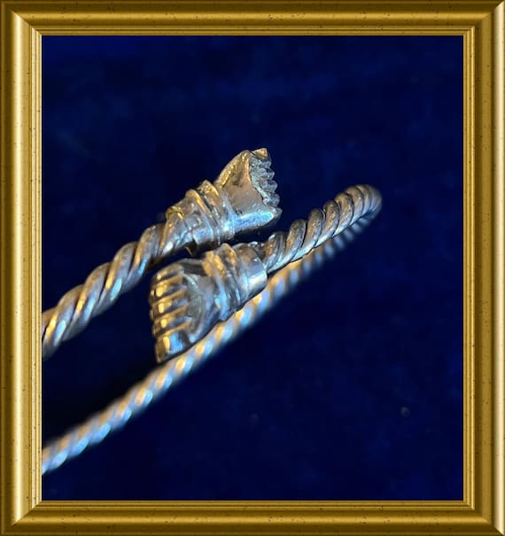 Vintage silver bangle bracelet with fists