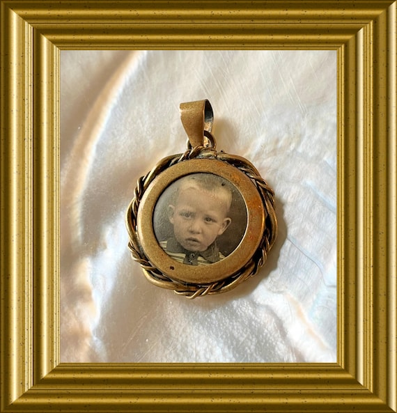 Vintage pendant with child's photograph, locket