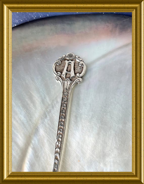 Lovely vintage silver teaspoon with the letter A