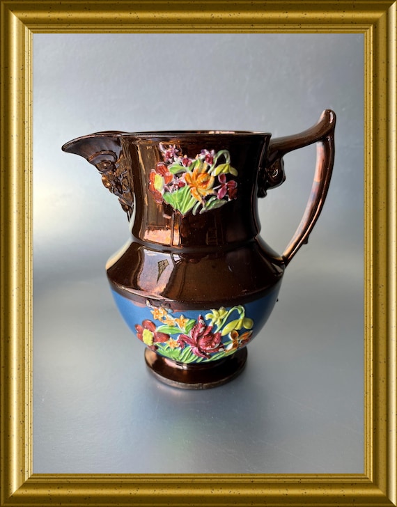 Antique English lusterware jug with flowers