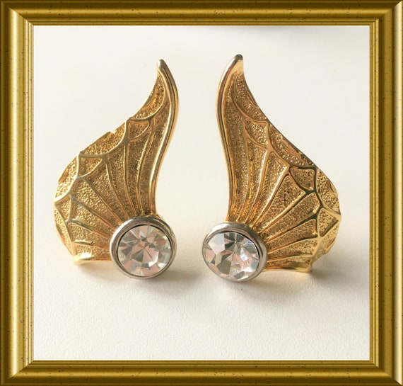 Vintage large gold tone clip on earrings