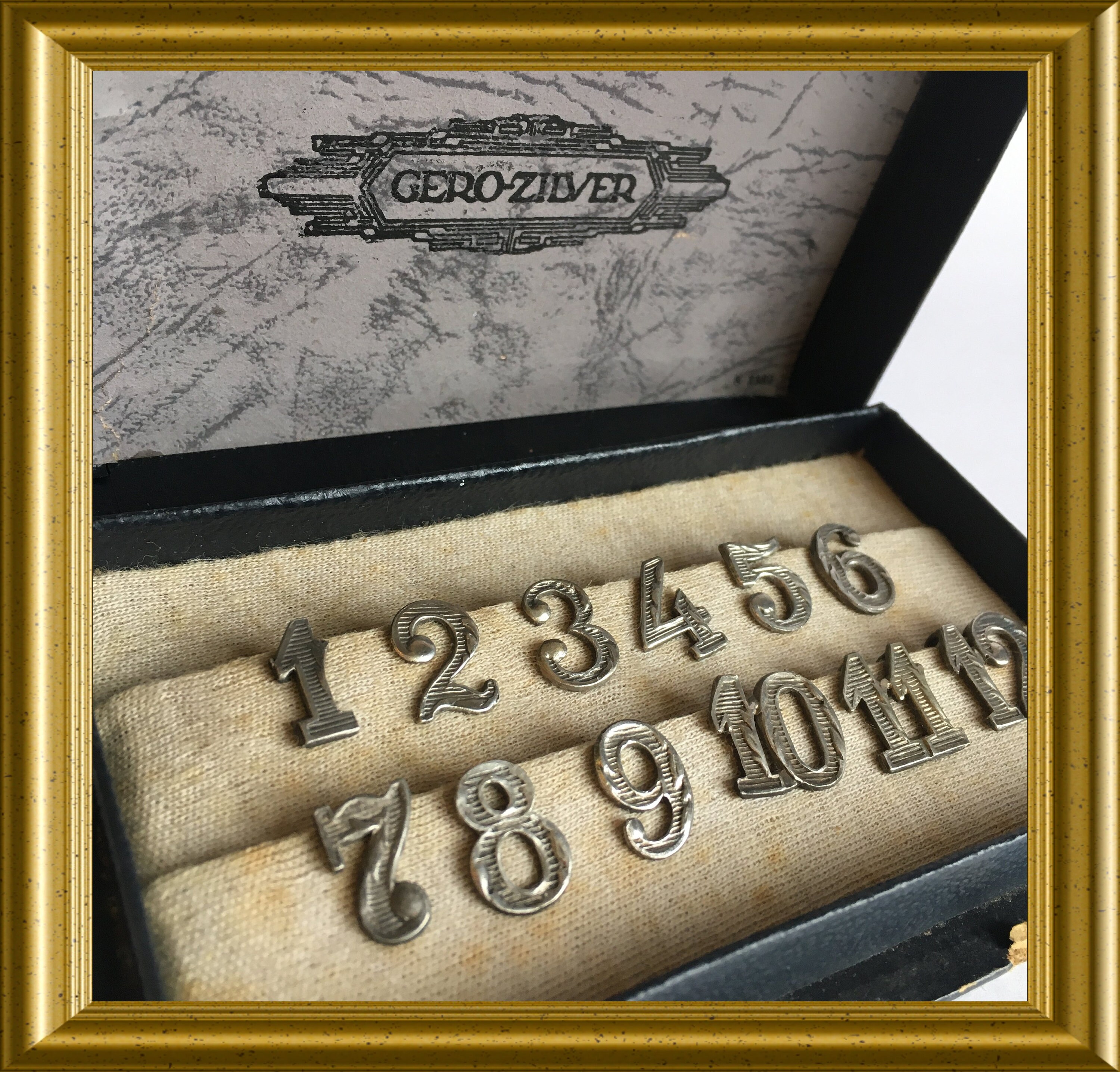 Silver plated numbers for drinking glass recognition Gero Holland