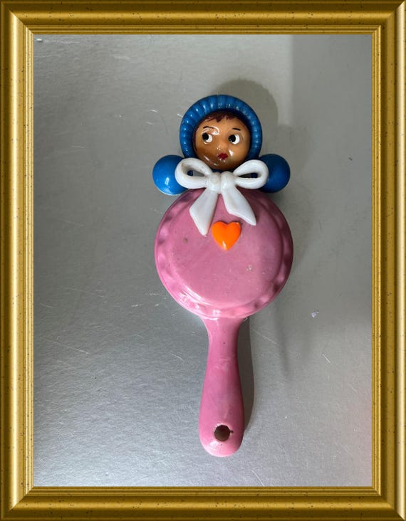 Vintage small pink rattle