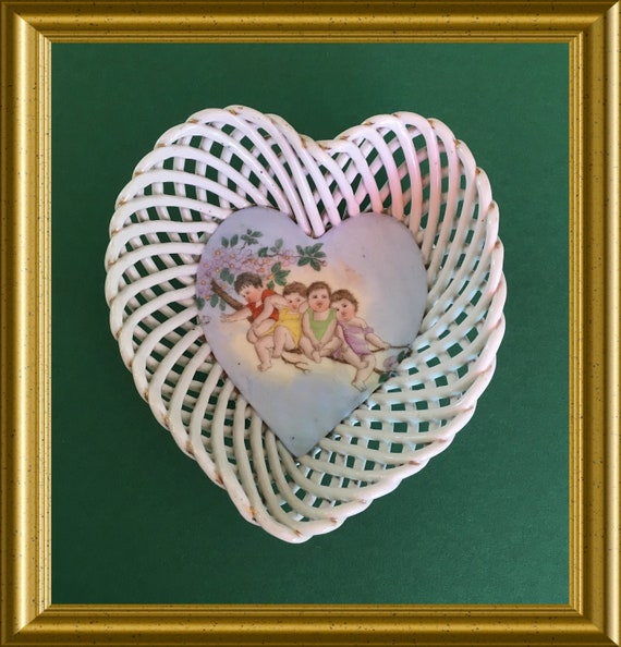 Antique heart shape porcelain bowl, children on a branch