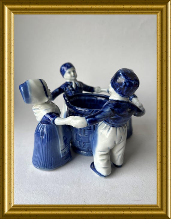 Charming vintage Delft blue porcelain figurine / pot / vase in traditional costume