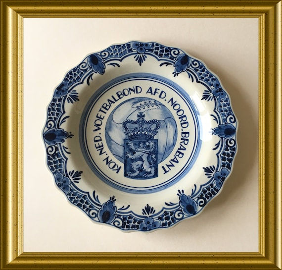 Hand painted Delft blue Gouda art pottery plate: KNVB, football, soccer, Noord Brabant